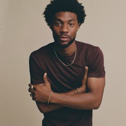 Jonathan Daviss, who plays Pope in Outer Banks Season 4, in a photoshoot for Bustle.