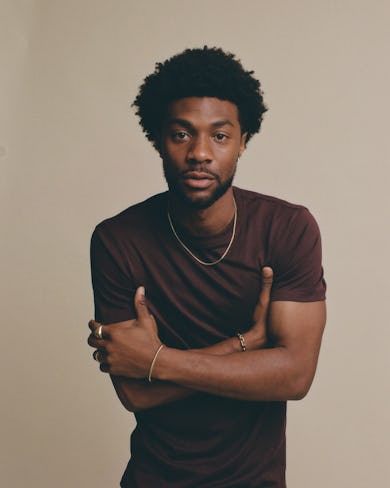 Jonathan Daviss, who plays Pope in Outer Banks Season 4, in a photoshoot for Bustle.