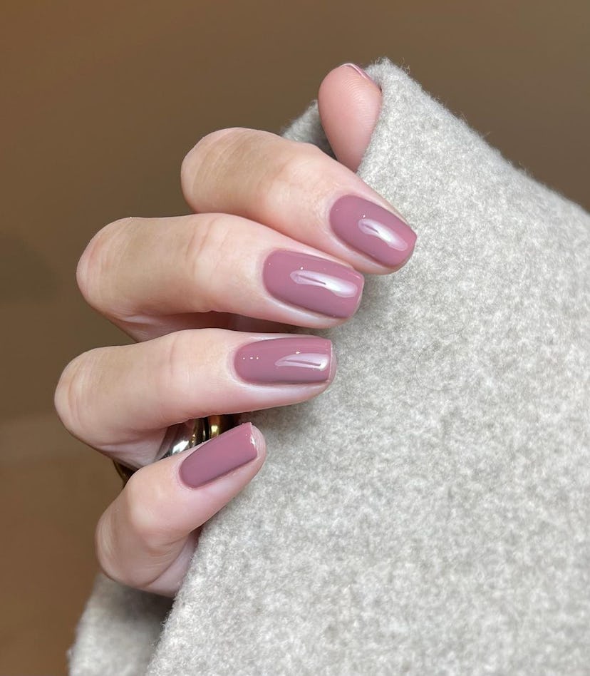 Mauve nails are on-trend for fall 2024.