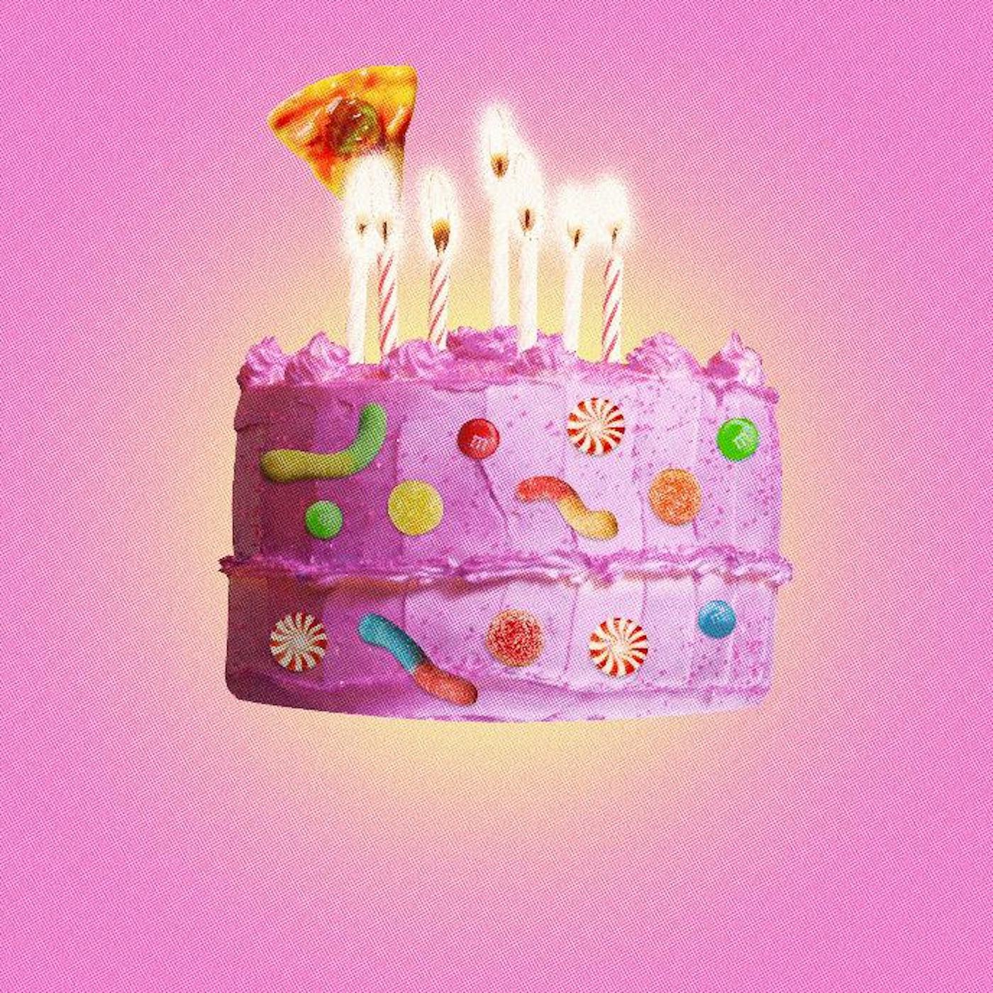 Every Year, All The Leftover Halloween Candy Goes Onto A Birthday Cake