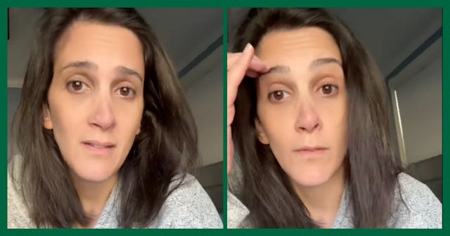 A woman in a cozy setting looks directly at the camera with a concerned expression. She appears thou...