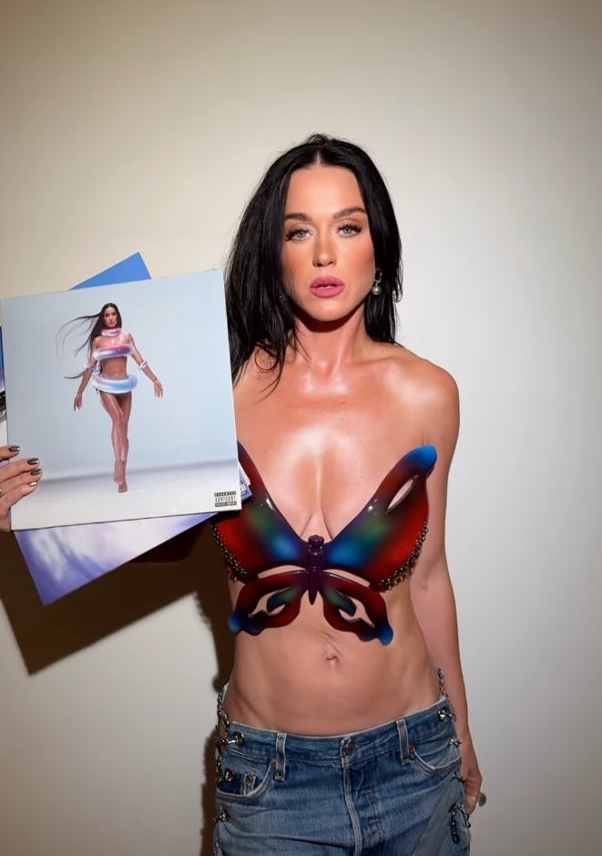 Katy Perry wore a butterfly bra top to promote her new album &lsquo;143.'