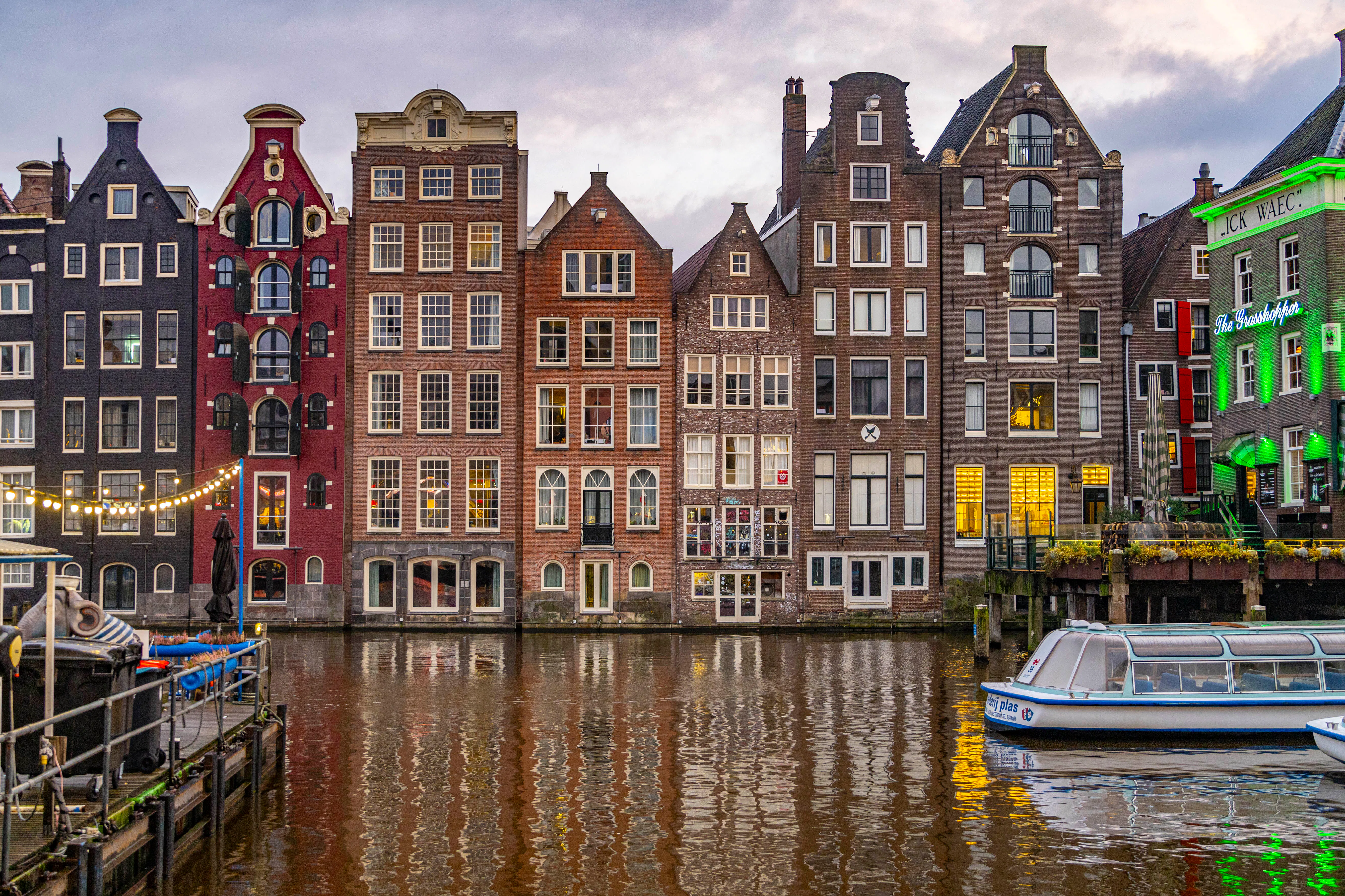 General view of Amsterdam's city center with the canals, boats, the famous for their architectural s...
