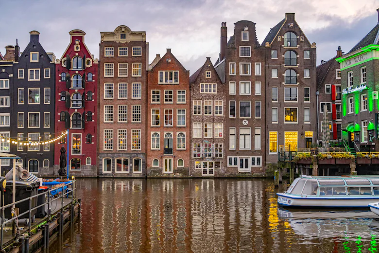 General view of Amsterdam's city center with the canals, boats, the famous for their architectural s...