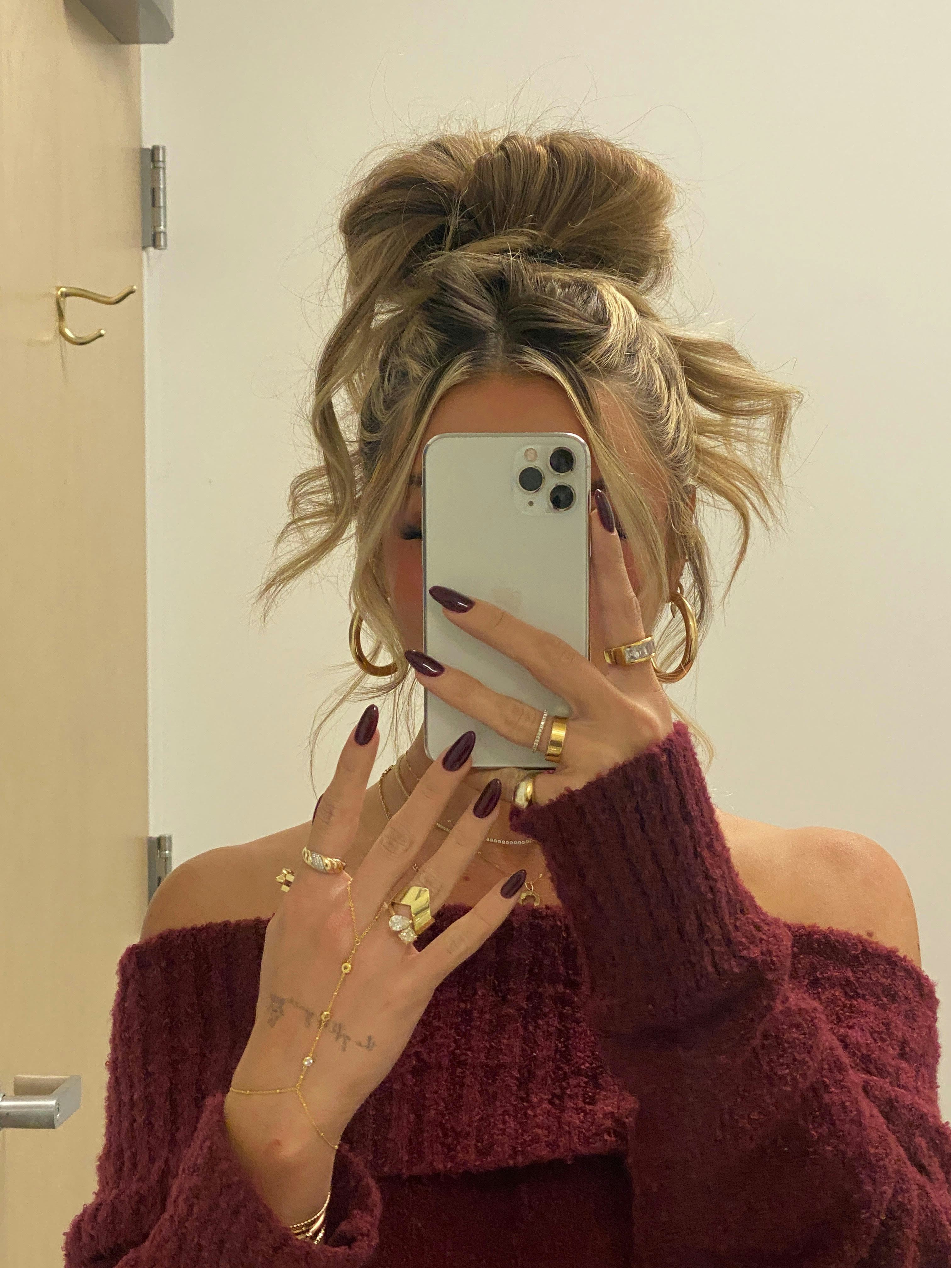 Burgundy nails are trending for fall 2024.