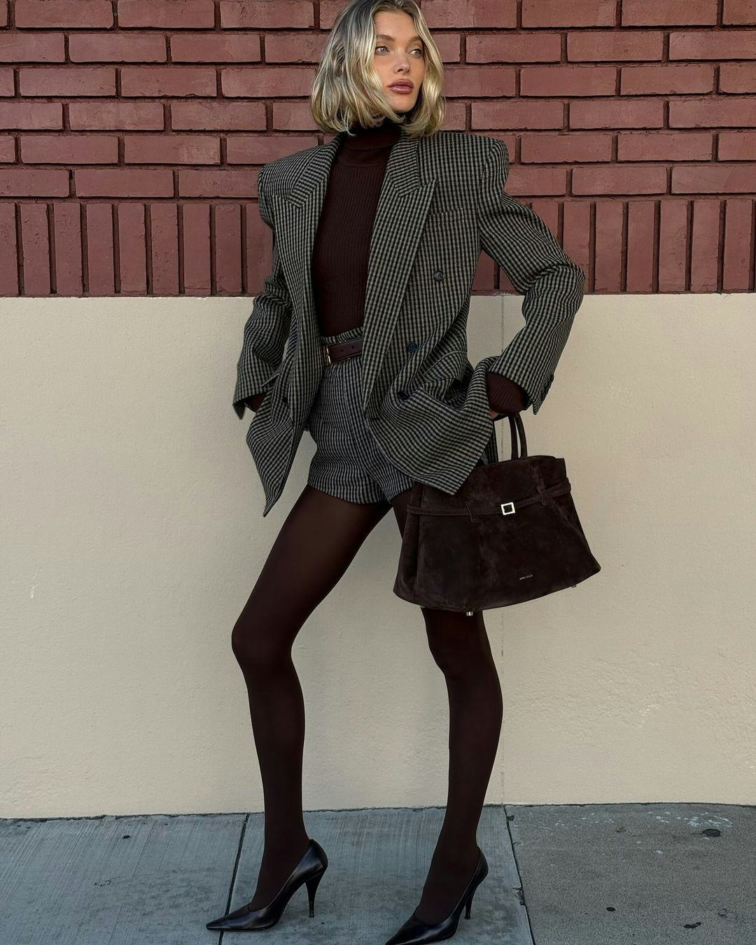 Elsa Hosk wears a blazer with matching shorts.