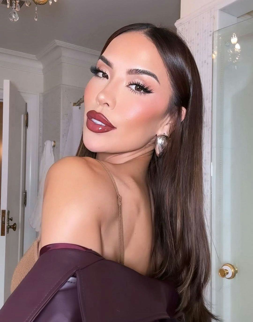 Cherry mocha lips are trending for fall 2024.