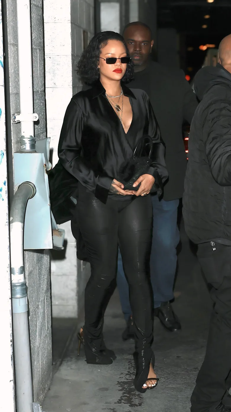 Rihanna Pairs the "Pop of Red" Theory With a Mob Wife Fur & Polka-dot Dress