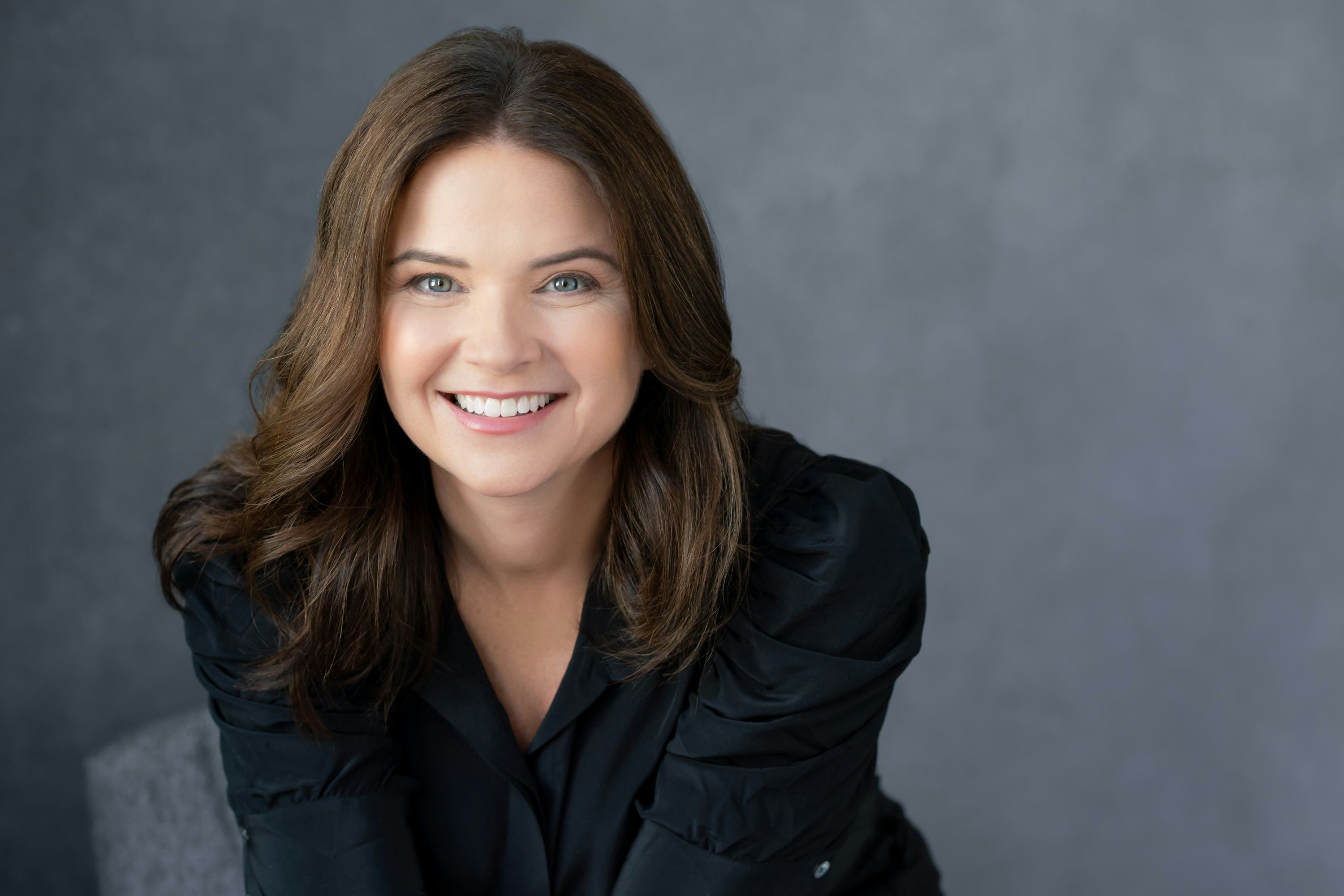 Amy Wilson is the author of Happy to Help.