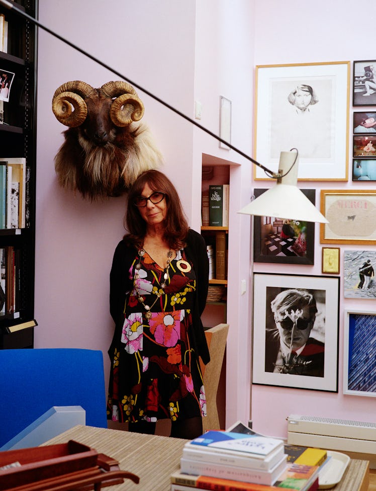 Calle in her home studio with a taxidermy piece and several personal artworks. Courtesy of the Artis...