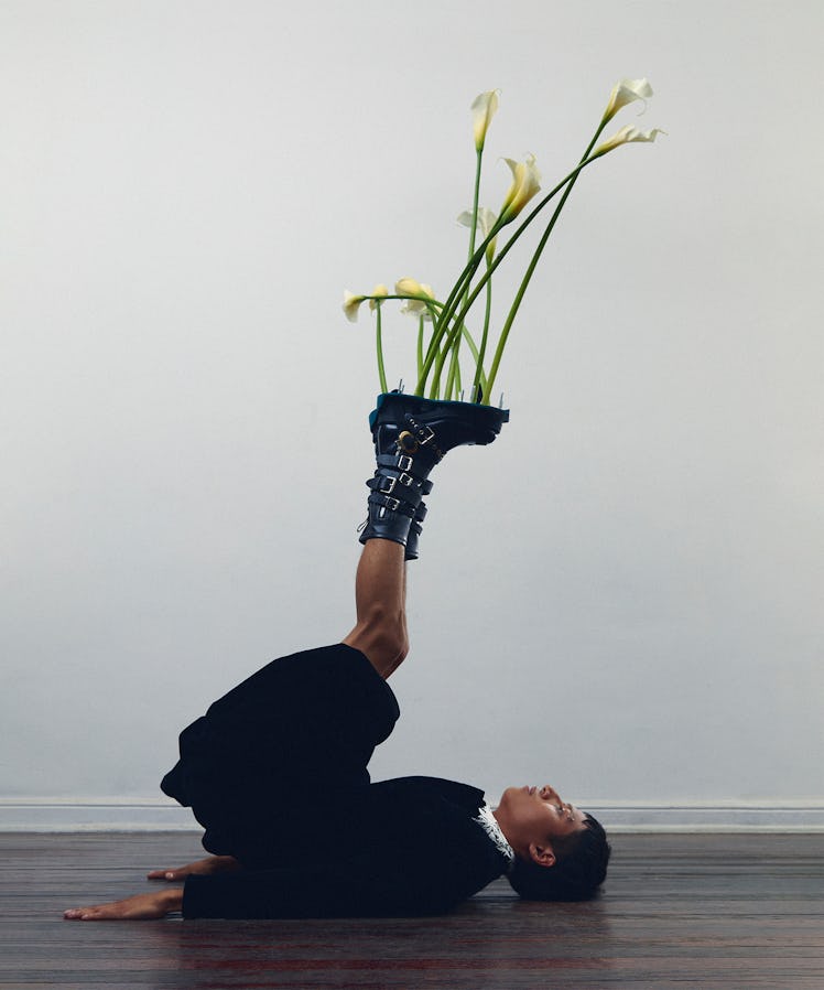 Model Oliver Chávez wears a Dior top, skirt, and boots. “I’m obsessed with calla lilies, and this ou...