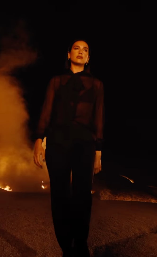 Dua Lipa forgot to wear a bra in her latest YSL Beauty campaign.