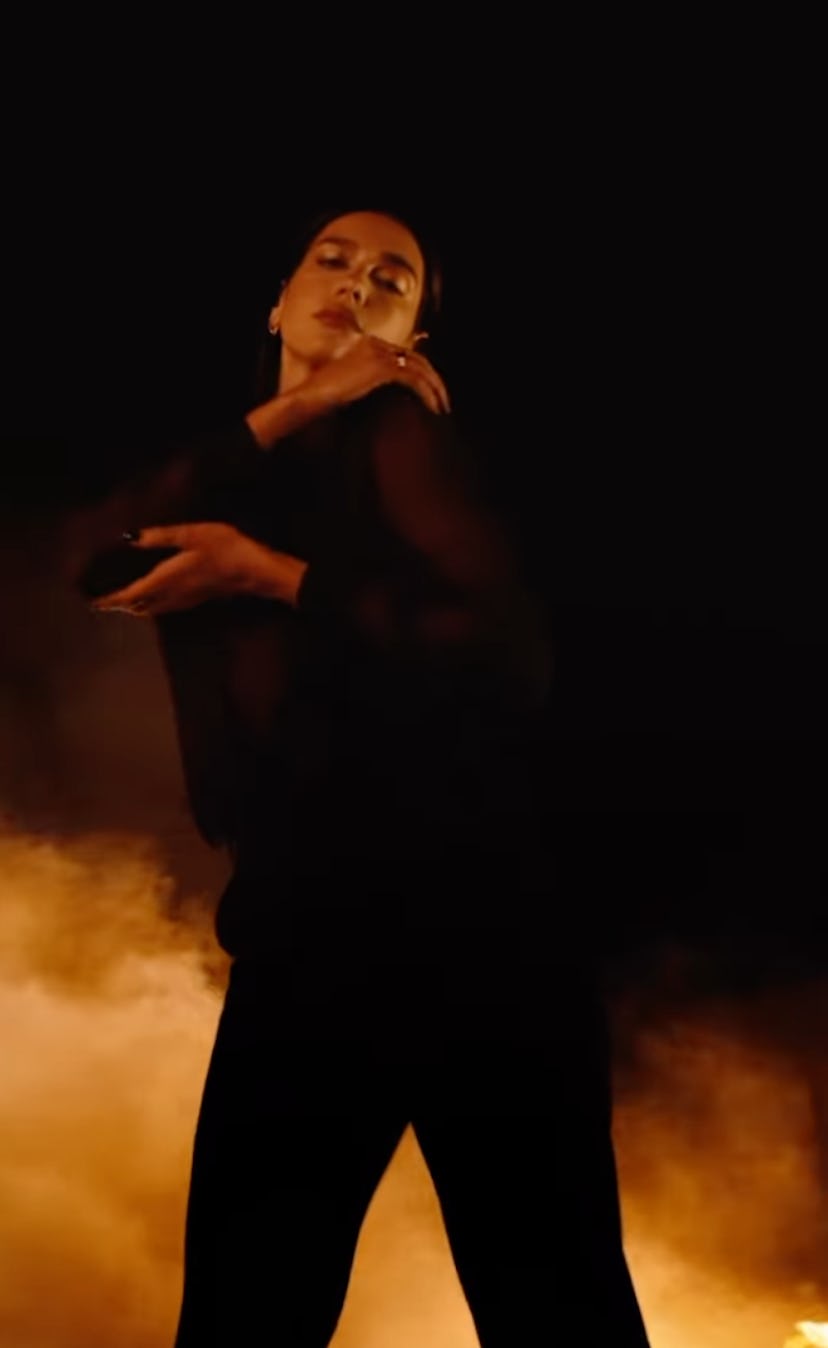 Dua Lipa forgot to wear a bra for her latest YSL Beauty campaign.