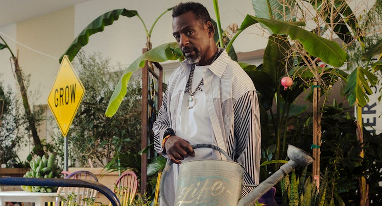 Ron Finley with his installation Grounded, 2024, at the Hammer Museum, in Los Angeles. Finley wears ...