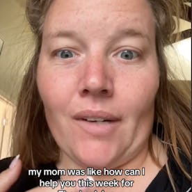 A woman with messy hair is speaking directly to the camera, expressing surprise about her mom's offe...