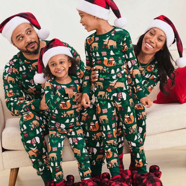 Family wearing matching christmas pajamas from the children's place on shein