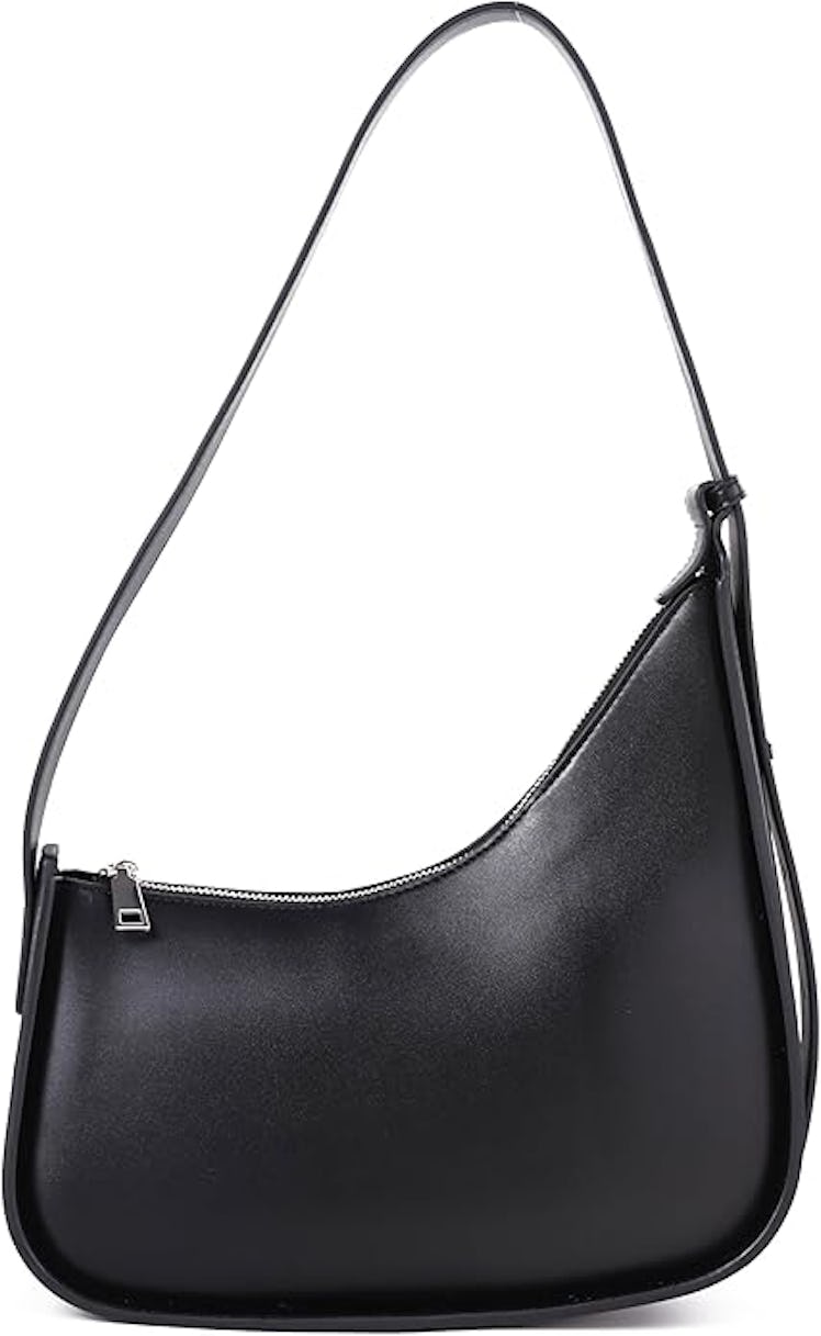 This asymmetrical bag is a close dupe to Taylor Swift's Dior saddle bag. 