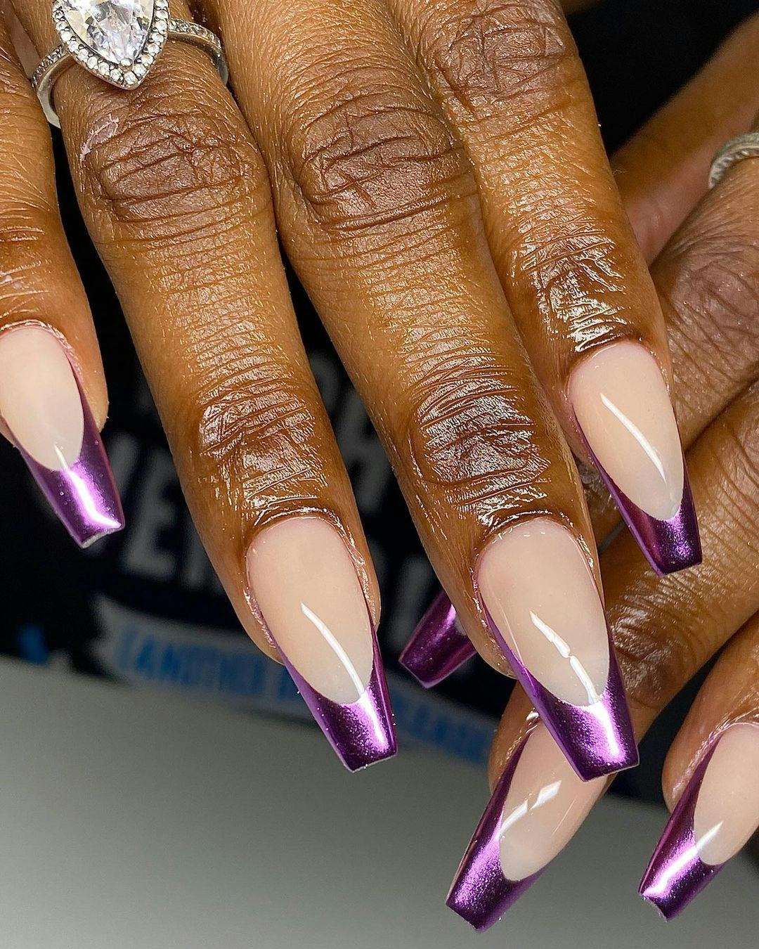 Purple chrome nails are on-trend for winter 2025.