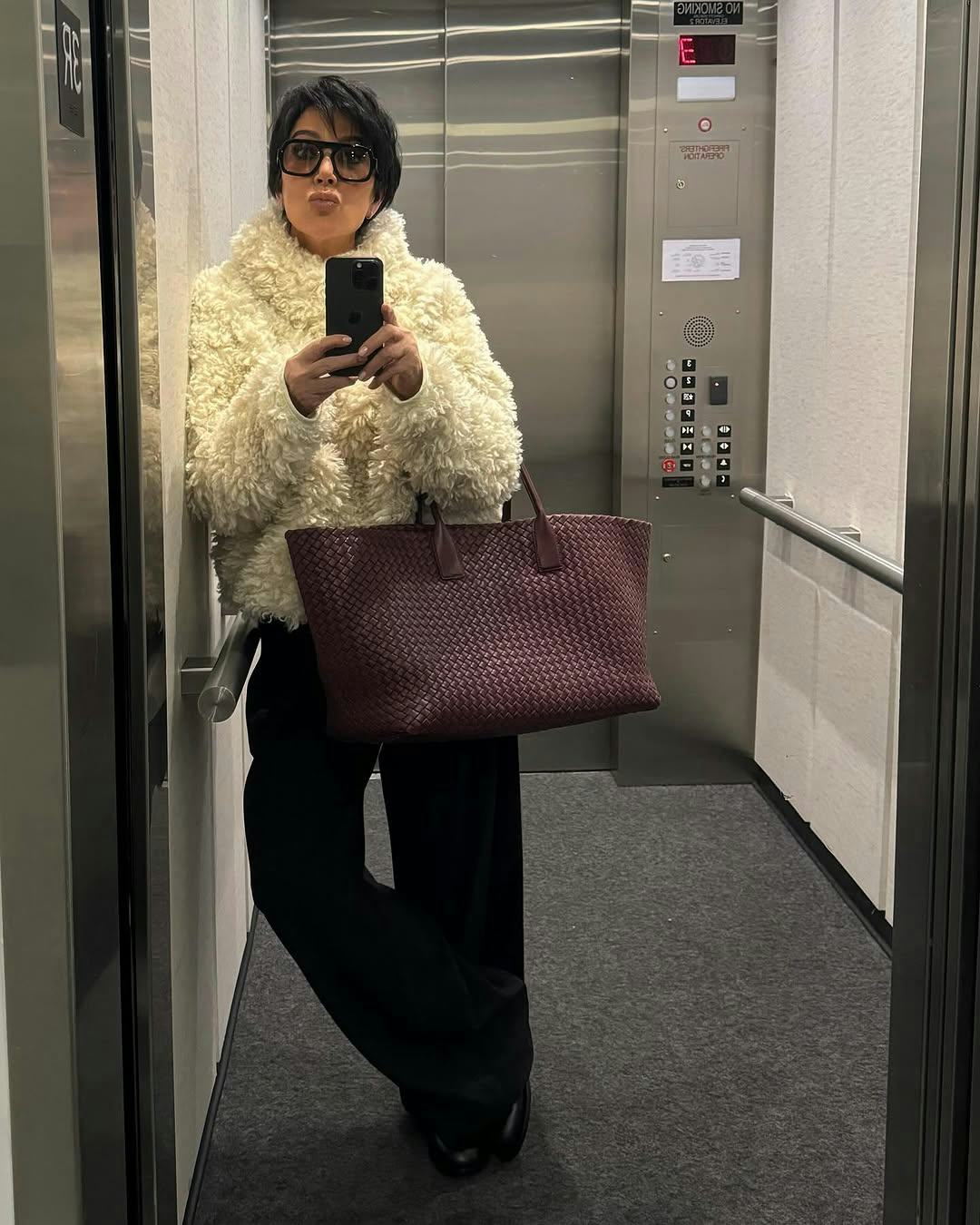 Kris Jenner wears a shaggy pullover from Khy.