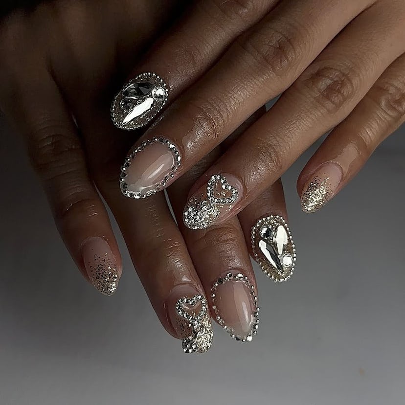 “Ice princess” manicures are on-trend for winter 2025.
