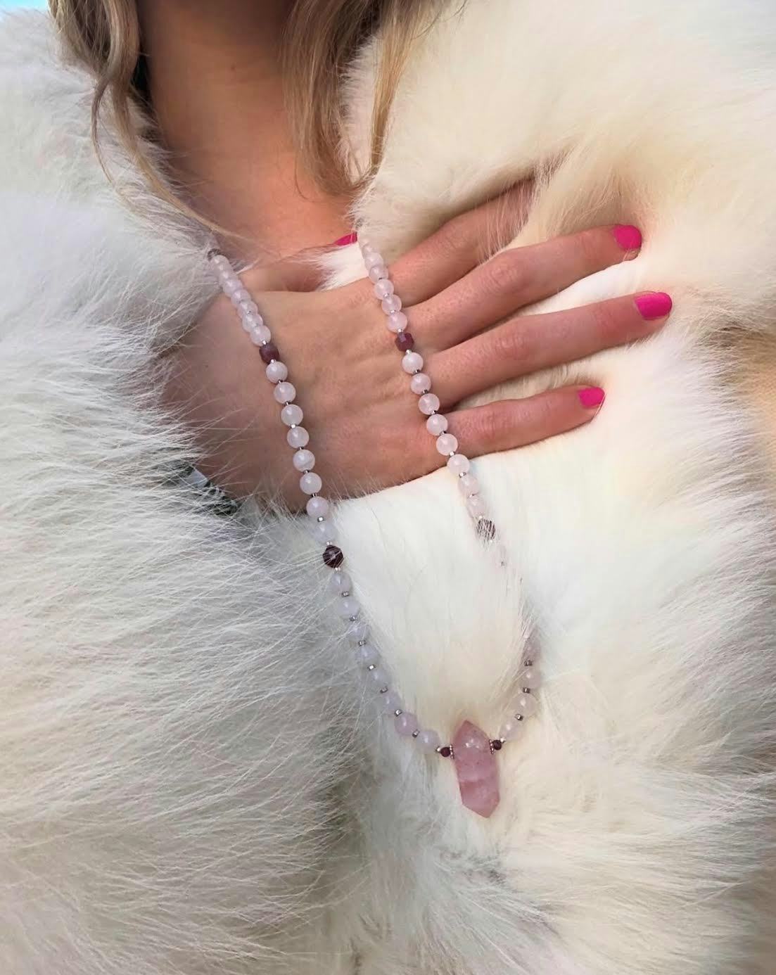 Addison Rae wore a hot pink manicure for winter 2025.