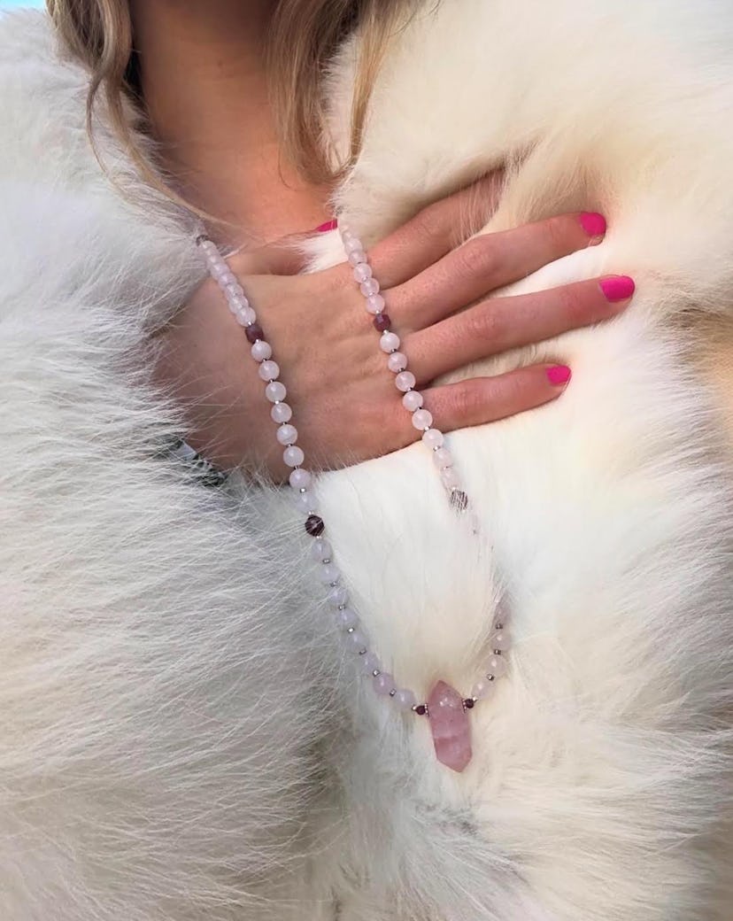 Addison Rae wore a hot pink manicure for winter 2025.