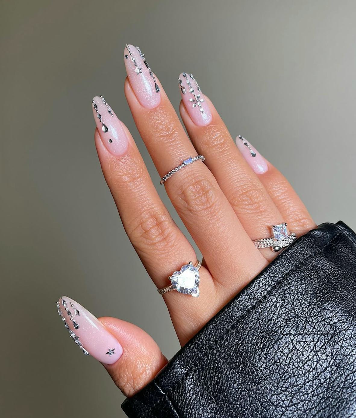 Complete your "ice princess" look with these cool-toned and sparkling nail art designs.