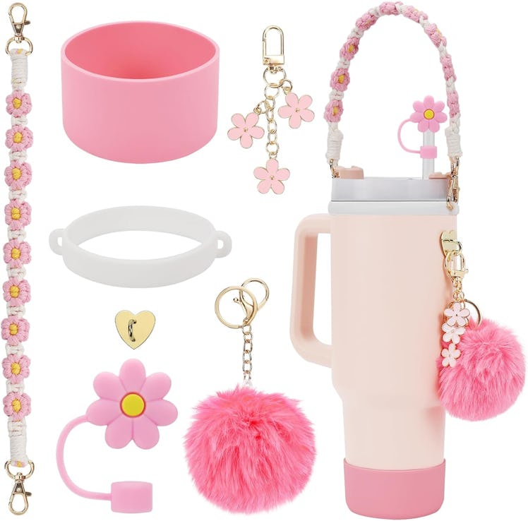 This pink Stanley cup accessory set comes with a handle and charms. 