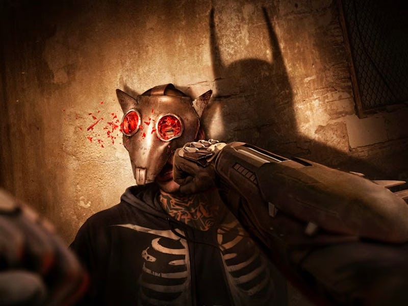 Batman punches a rat goon in the face