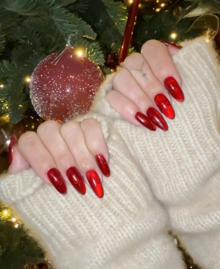 Vanessa Hudgens has red &ldquo;glass nails&rdquo; for Christmas 2024.