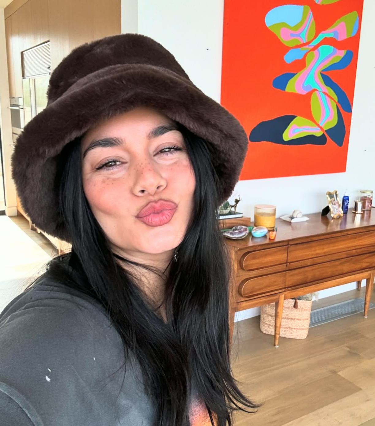 Vanessa Hudgens' red "glass nails" are perfect for the holiday season.