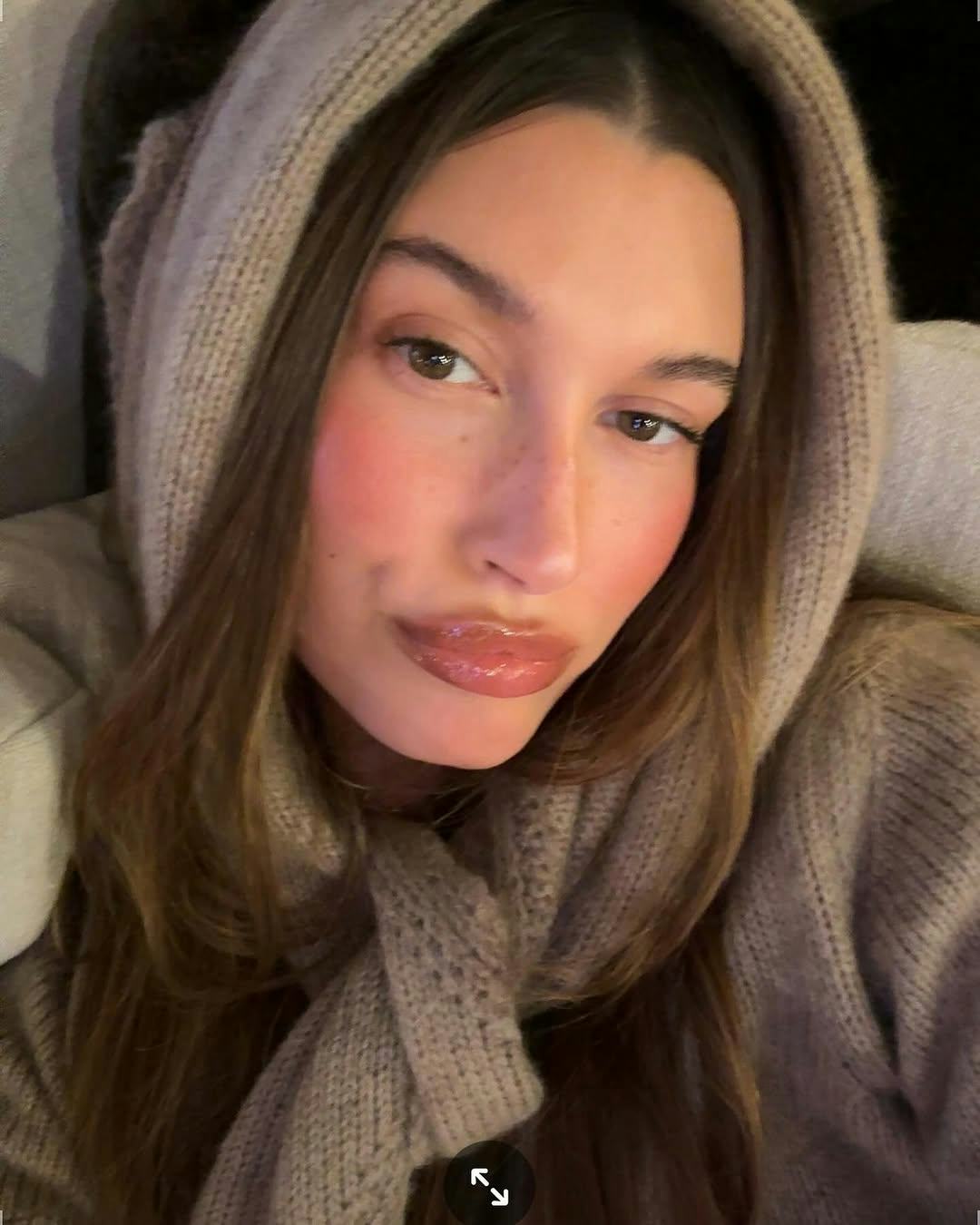 Hailey Bieber wears a chunky hoodie. 