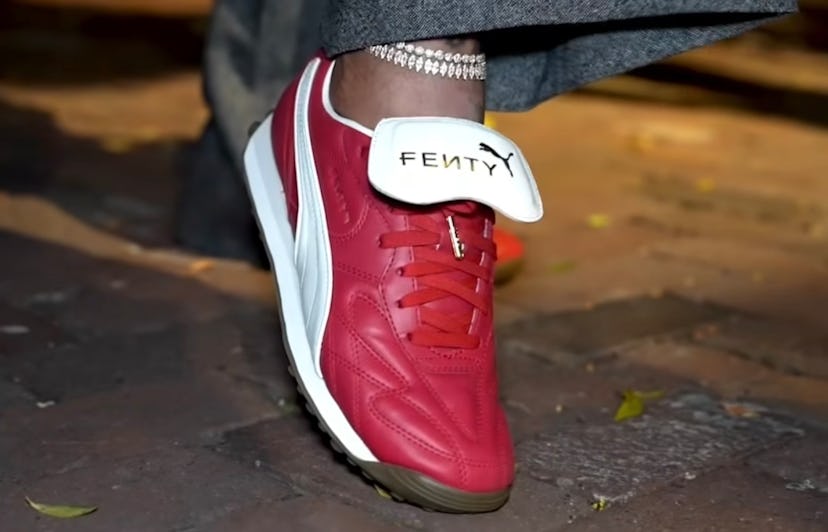 Rihanna wears Fenty X Puma sneakers.