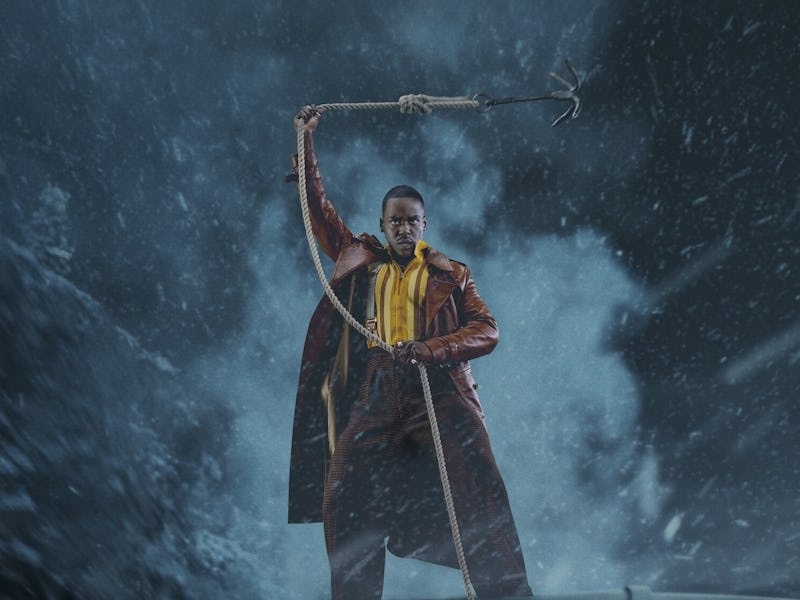 The 15th Doctor (Ncuti Gatwa) swinging a grappling hook in the 'Doctor Who' 2024 Christmas Special, ...