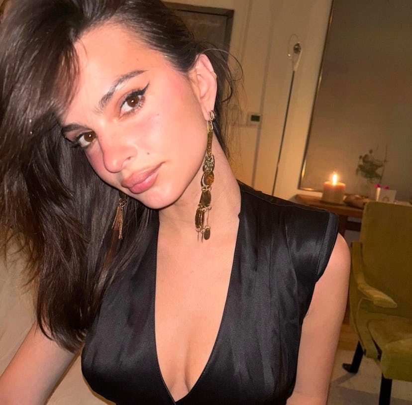 Emily Ratajkowski wore a plunging black dress.
