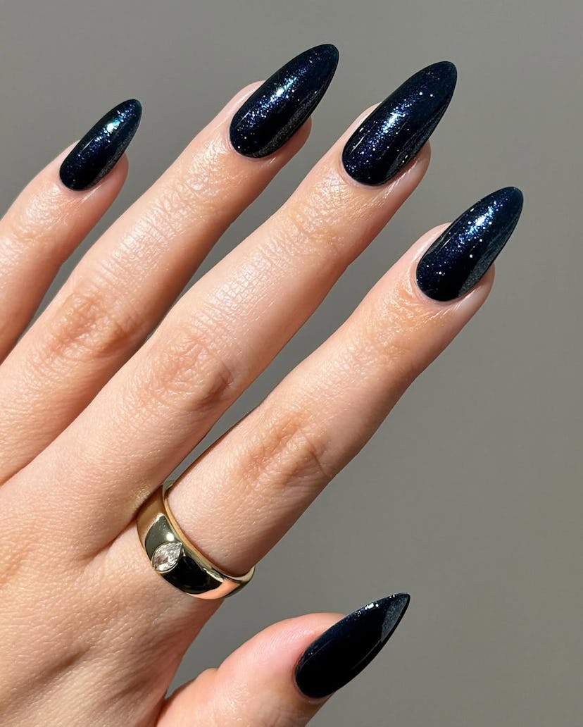 Try sparkling sapphire nails for New Year’s Eve 2024.