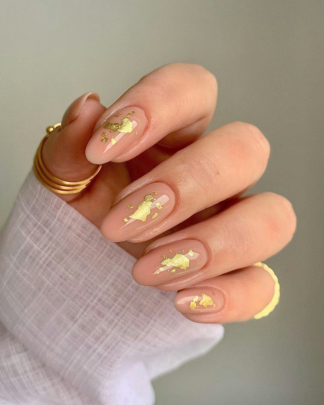 Gold nails fit the &ldquo;goddess energy aesthetic."
