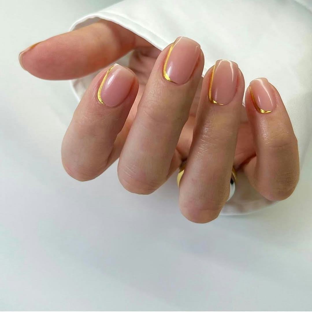 Gold nails fit the &ldquo;goddess energy aesthetic."