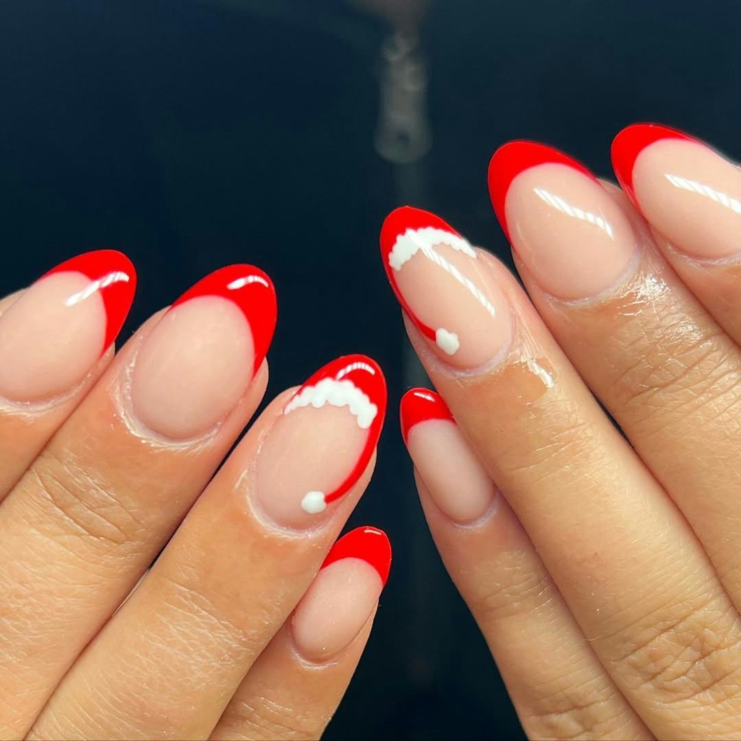 Try Santa&rsquo;s hat French tip nails for Christmas 2024.