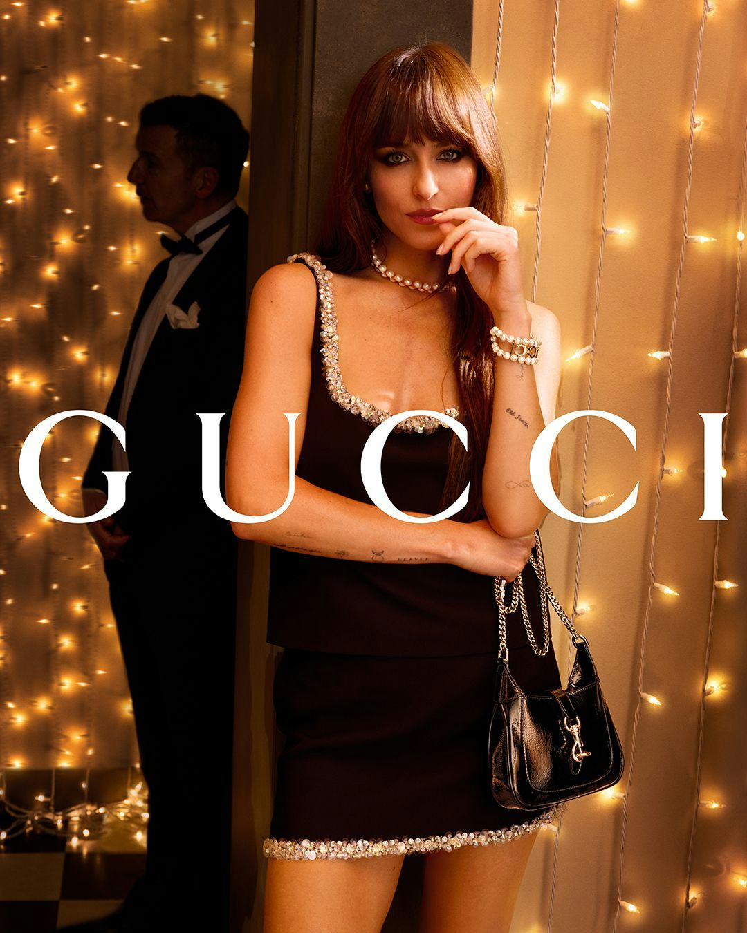 Dakota Johnson stars in the Gucci Gift holiday campaign.