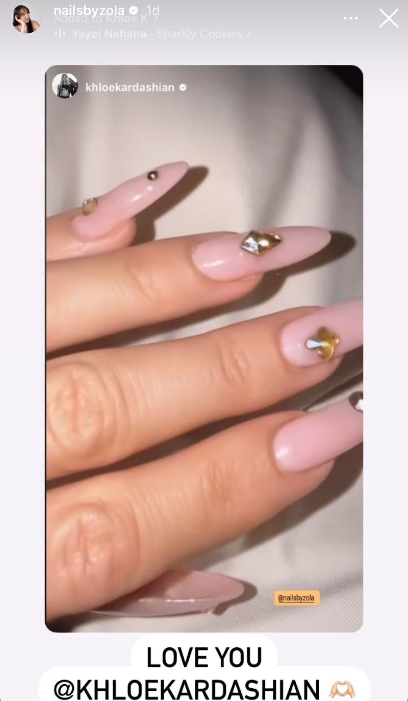 Khloé Kardashian wore gemstone-covered nails in London.