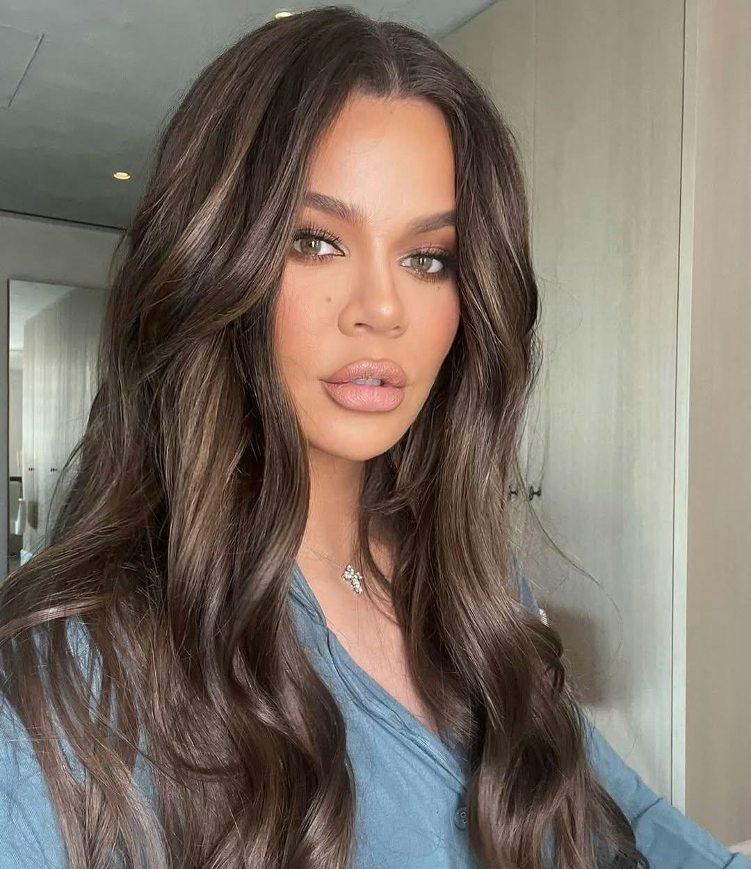 Take a closer look at Khloé Kardashian's gemstone-covered nails.