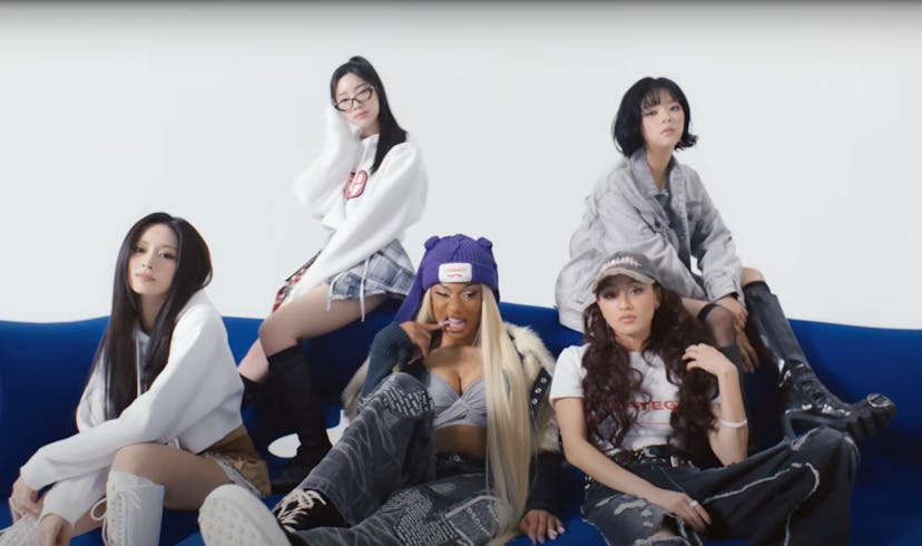 TWICE and Megan Thee Stallion in the “STRATEGY” music video.