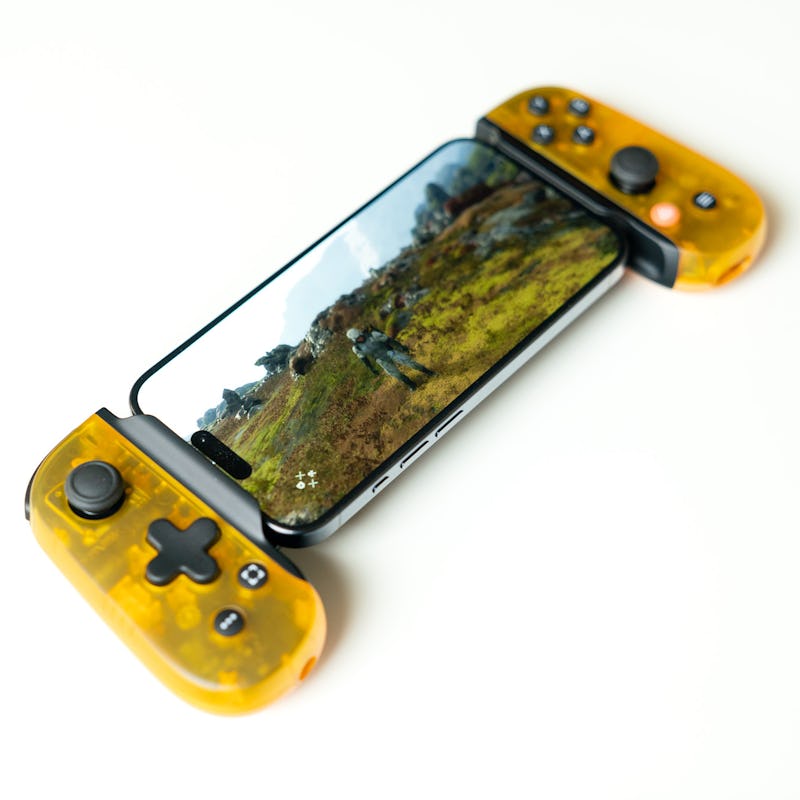 Kojima Productions' Death Stranding game running on an iPhone 15 Pro with the limited edition Backbo...