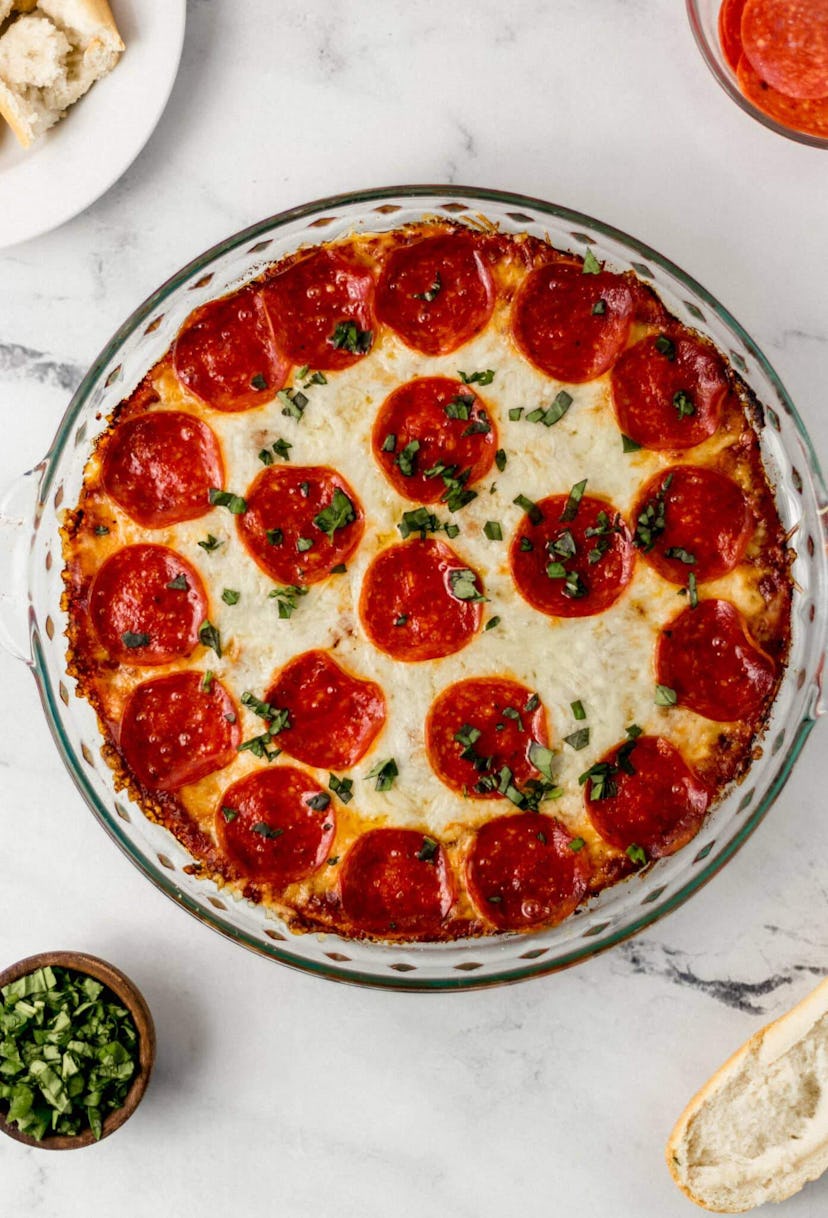 Pepperoni pizza dip, a delicious super bowl dip to celebrate the big game.