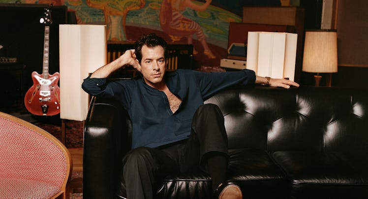Mark Ronson wears a Gucci top, pants, and shoes; Falke socks; his own watch.