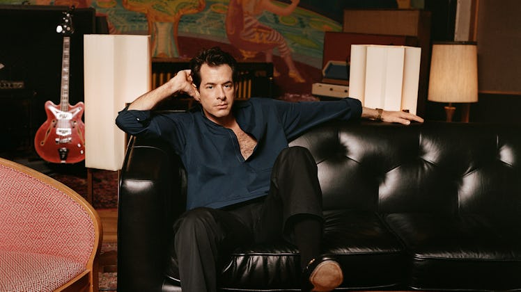 Mark Ronson wears a Gucci top, pants, and shoes; Falke socks; his own watch.