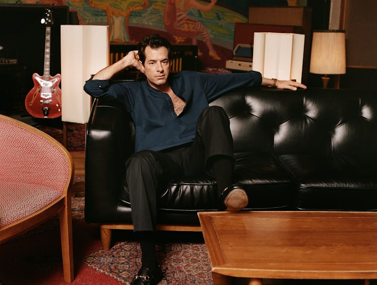 Mark Ronson wears a Gucci top, pants, and shoes; Falke socks; his own watch.