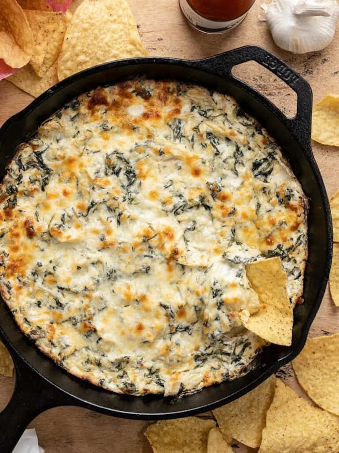 Skillet spinach artichoke dip, a delicious super bowl dip to celebrate the big game.