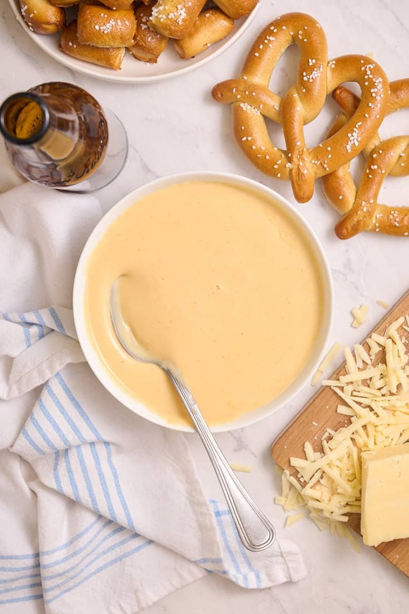 Beer Cheddar Cheese Dip, a delicious super bowl dip to celebrate the big game.